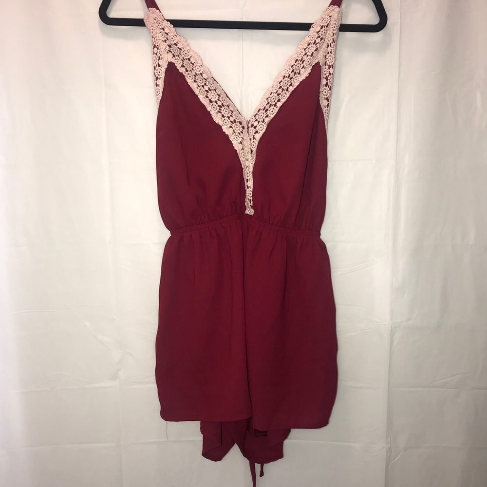 Red romper.
